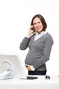Pregnant woman talking on mobile phone Royalty Free Stock Photo