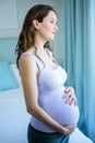 Pregnant woman touching her belly Royalty Free Stock Photo