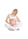 Pregnant woman touching her lovely belly Royalty Free Stock Photo