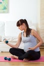Pregnant woman during training Royalty Free Stock Photo