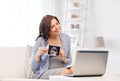 Pregnant woman with ultrasound image and laptop Royalty Free Stock Photo