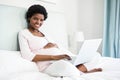 Pregnant woman using laptop Royalty Free Stock Photo