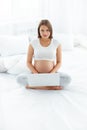 Pregnant Woman Using Laptop Computer Royalty Free Stock Photo