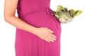 Pregnant woman with vegetable