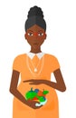 Pregnant woman with vegetables. Royalty Free Stock Photo