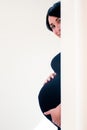 Pregnant woman on white background