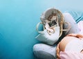 Pregnant woman with wicker basket of stuff newborn baby and ultrasound image. Mother waiting and preparing to child birth during Royalty Free Stock Photo