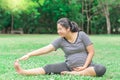 Pregnant woman work out in the garden. Royalty Free Stock Photo