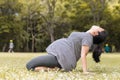 Pregnant woman work out in the garden. Royalty Free Stock Photo