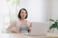 Pregnant woman working on laptop at home Royalty Free Stock Photo