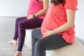 Pregnant women are doing yoga and maditition in yoga class, Healthy prenatal lifestyle Royalty Free Stock Photo