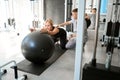 Pregnant woman is exercising under the supervision of a physiotherapist Royalty Free Stock Photo