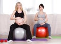 Pregnant women with large gymnastic balls