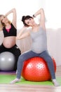 Pregnant women with large gymnastic balls