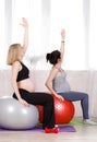 Pregnant women with large gymnastic balls