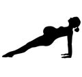 Pregnant women, mother to be trains fitnes sport aerobics, does yoga Pilates. Silhouette