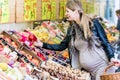 Pregnant woman shopping groceries on farmers market Royalty Free Stock Photo