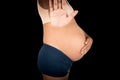 Pregnant women show hand stop on gray background Royalty Free Stock Photo