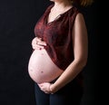 Pregnant women showing her belly Royalty Free Stock Photo