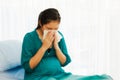 Pregnant women suffer from the flu during treatment for complications in the hospital. Royalty Free Stock Photo