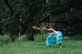 Pregnant yoga prenatal maternity doing different exercises. in the park on the grass, breathing, stretching, statics. Royalty Free Stock Photo