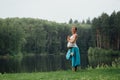 Pregnant yoga prenatal maternity doing different exercises. in the park on the grass, breathing, stretching, statics. Royalty Free Stock Photo