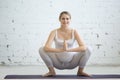 Pregnant young woman doing prenatal yoga. Garland, Malasana Pose Royalty Free Stock Photo