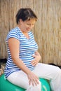 Pregnant young woman exercising Royalty Free Stock Photo