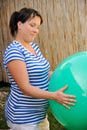 Pregnant young woman exercising with ball Royalty Free Stock Photo