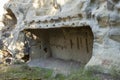 Prehistoric caves carved in sandstone. Called Grottes de Cales. Royalty Free Stock Photo