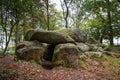 Prehistoric megalithic tomb or dolmen, an excavated and reconstructed passage grave from larges stones in the forest of Klein