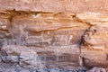 Prehistoric rock paintings of a dead dear, fish and shaman in Canon La Trinidad near Mulege, Baja California Sur, Mexico Royalty Free Stock Photo