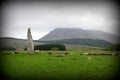 Prehistoric standing stone monolith on Scottish island Royalty Free Stock Photo