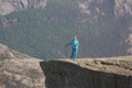 Preikestolen - landscape of tourist at the top of spectacular Pulpit Rock cliff