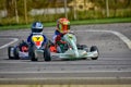 PREJMER, BRASOV, ROMANIA - MAY 3: Unknown pilots competing in National Karting Championship Dunlop 2015, Royalty Free Stock Photo