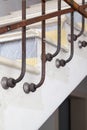 preliminary installation of decorative fasteners of metal handrails to steps
