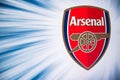 LONDON, ENGLAND, JULY. 1. 2019: Arsenal Football club logo, Premier League, England. Soccer player silhouette Royalty Free Stock Photo