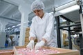 Shymkent, Kazakhstan - 03.12.2020 : Rakhat confectionery factory. Employees are engaged in packaging marmalade candies Royalty Free Stock Photo
