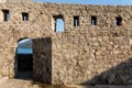 Premises of the fortress under the thatched roof during the sun with shade Royalty Free Stock Photo