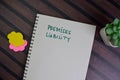 Premises Liability write on a book isolated on Wooden Table Royalty Free Stock Photo