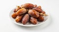 Premium Ajwa Dates for Ramadan Iftar on White Background Royalty Free Stock Photo