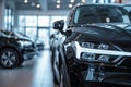 Premium black SUVs in modern dealership showroom with huge windows