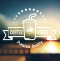 Premium coffee label design over defocus background Royalty Free Stock Photo