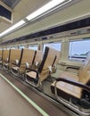 Premium economy train passenger seats in Indonesia.