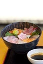 Premium fresh raw seafood mixed rice bowl Kaisen-don/ Japanese tasty food, Japanese Rice with sashimi of tuna, Maguro, Otoro, Royalty Free Stock Photo