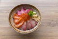 Premium fresh raw seafood mixed rice bowl Kaisen-don, Japanese tasty food, Japanese Rice with sashimi of tuna, Maguro, Otoro, Royalty Free Stock Photo