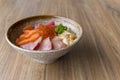 Premium fresh raw seafood mixed rice bowl Kaisen-don, Japanese tasty food, Japanese Rice with sashimi of tuna, Maguro, Otoro, Royalty Free Stock Photo