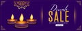 premium happy diwali sale banner with golden diya in purple background vector Royalty Free Stock Photo