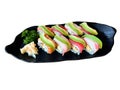 The premium Japanese avocado salmon roll on a black plate