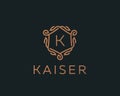 Premium linear shield monogram letter K logotype. Elegant crest leaf stamp icon vector logo. Luxury alphabet frame